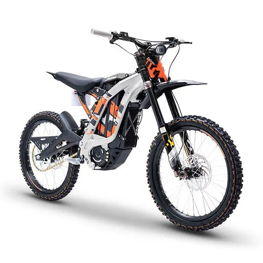 Surron Light Bee X ebike, silver frame with orange and black graphics, front three-quarter view on a white background