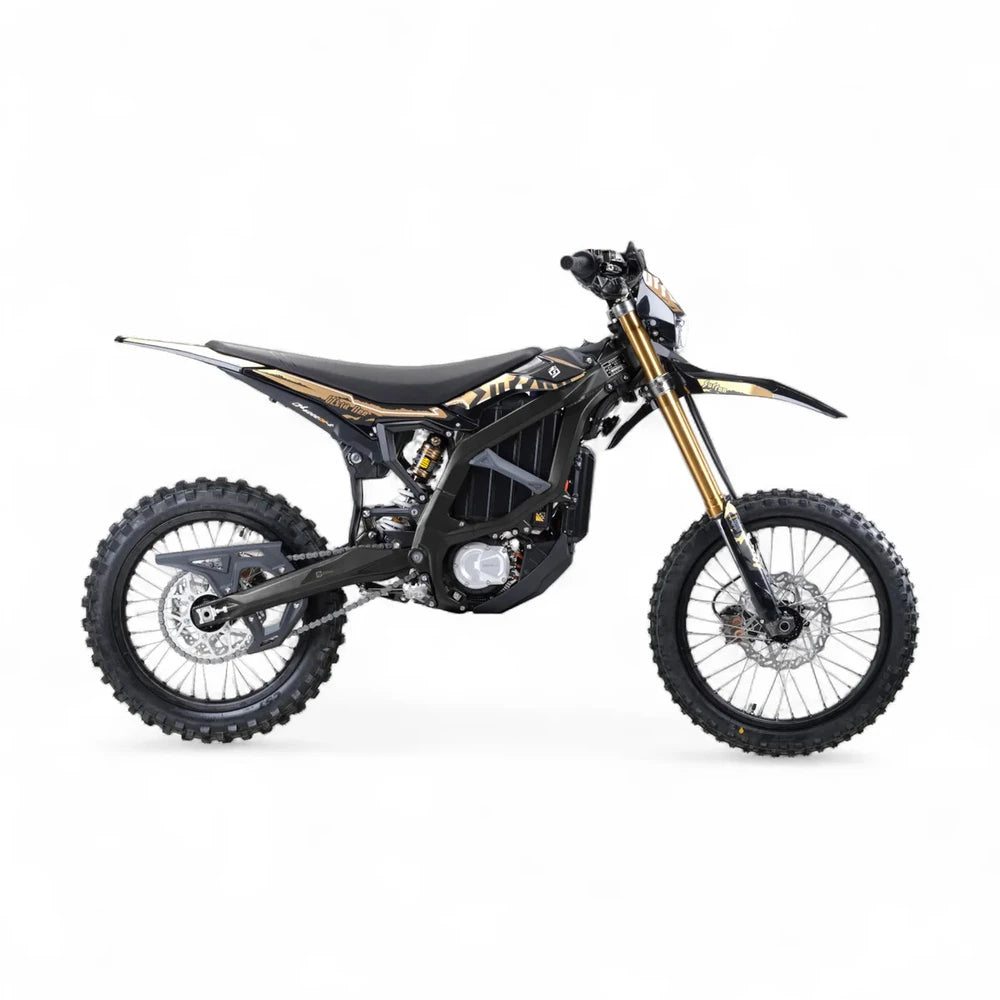 Right-side profile of 2025 Surron Ultra Bee Carbon Black showing battery frame and rear linkage detail