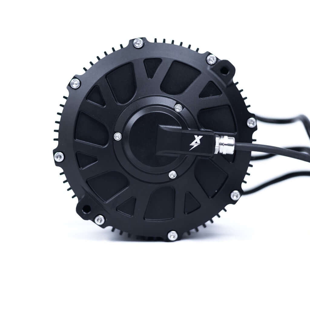 Surron Ultra Bee EBMX XUB-80 air-cooled mid-drive motor, black finned casing, front view with EBMX logo and cables