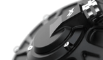 EBMX XTA-60 Talaria motor, matte black machined housing with hex bolts and embossed lightning-bolt logo, close-up angled detail
