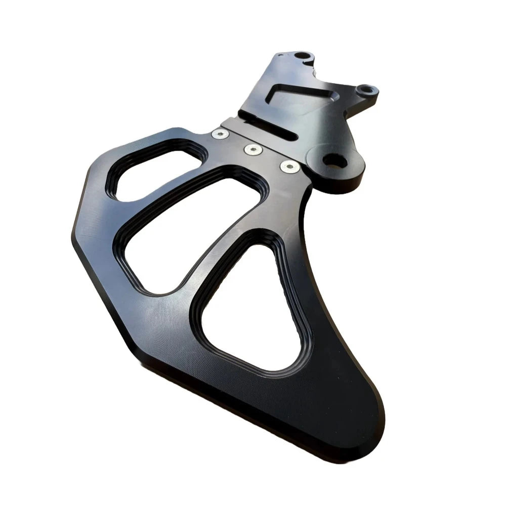 Angled close-up of Eride Pro CNC-machined single caliper bracket with built-in rotor shield