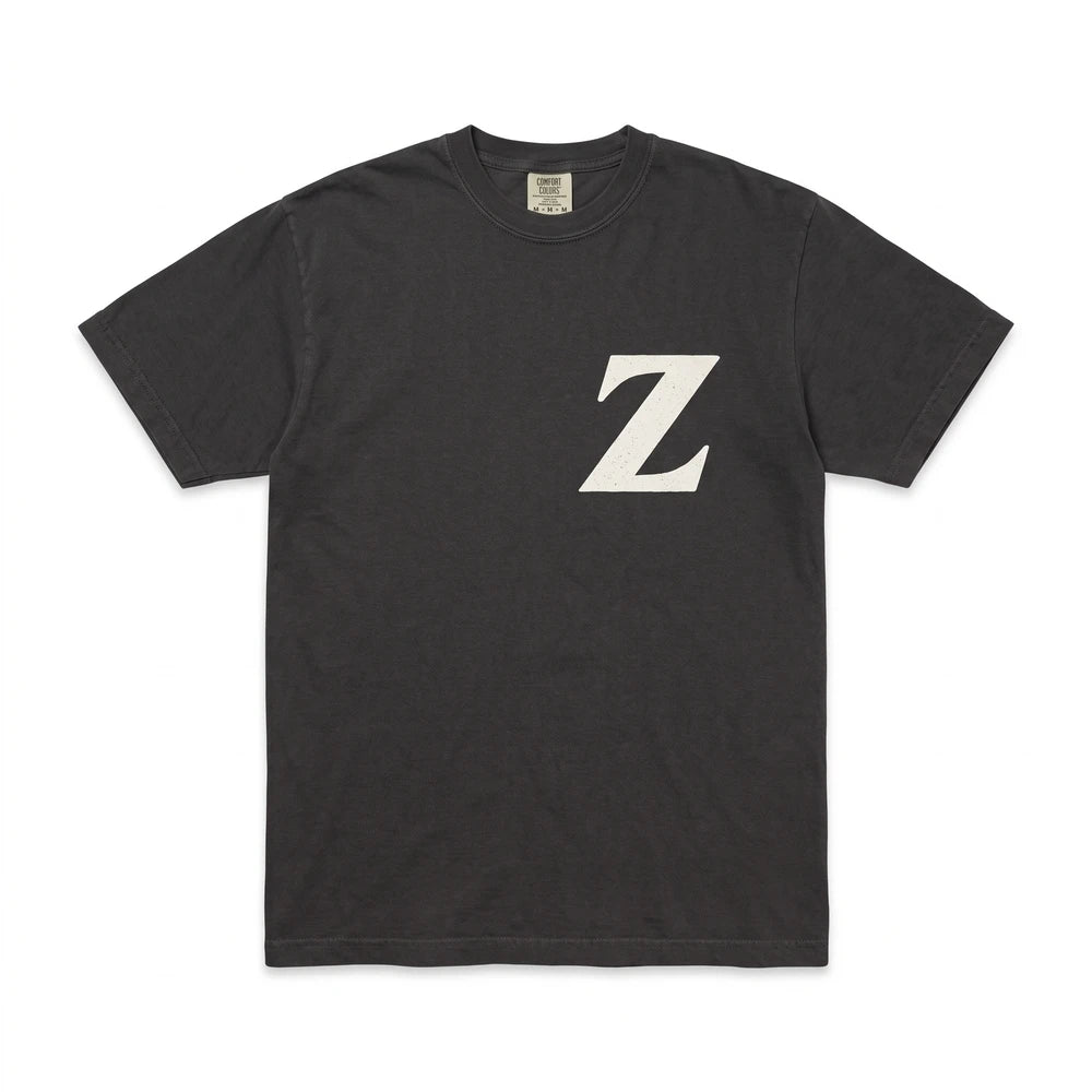 FactoryZ T Shirt front view, black Comfort Colors tee with small white Z screen printed over the left chest