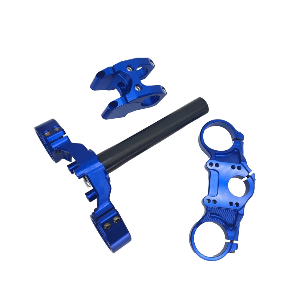 blue fastace triple clamp with steering tube and handlebar mount