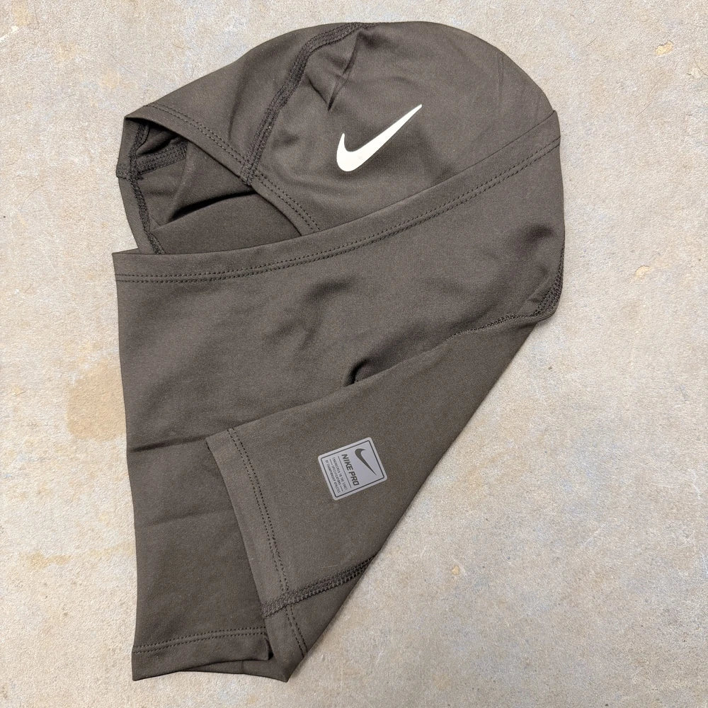 Nike Pro Therma-FIT Hood folded, showing swoosh detail