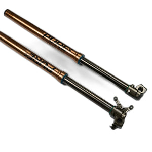 Pure Racing Traxion fork legs, stanchions, and CNC dropouts for Surron Ultra Bee