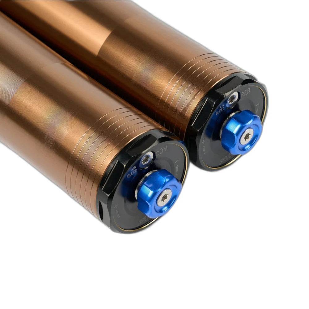 Compression and rebound adjuster dials with air bleed ports on the Pure Traxion fork