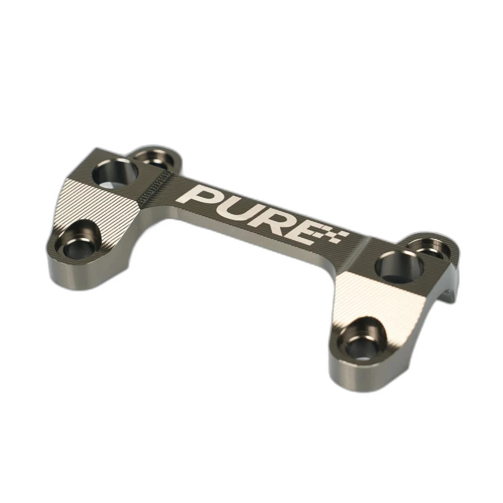CNC top handlebar clamp from the Pure Traxion triple clamp set