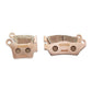 Stark Varg brake pads, front F04-007 and rear R04-009 sets side by side, copper-colored backing plates facing out