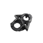surron carbon fiber kit ignition cover white background. 