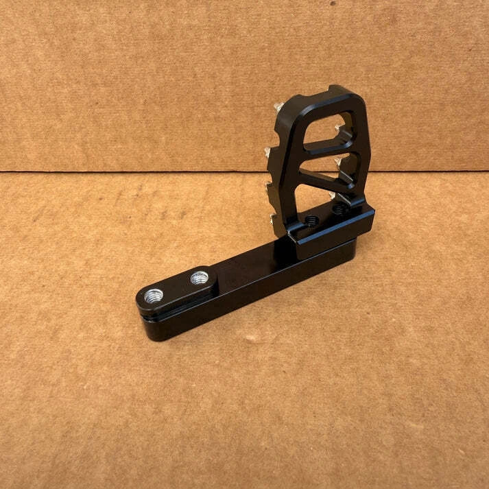 surron foot brake extension piece side view