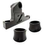 Surron front moto brake caliper mounting bracket, black anodized CNC billet with FactoryZ Z logo, plus two wheel spacers