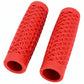 Surron waffle grips in red, angled pair showing the open inner ends and knurled end rings