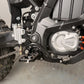 Surron Ultra Bee foot brake installed on the bike, silver HSK master cylinder, braided line, black lever and peg