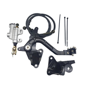 Upgraded Surron Ultra Bee V2 foot brake system with billet pedal, master cylinder, and mounts in black