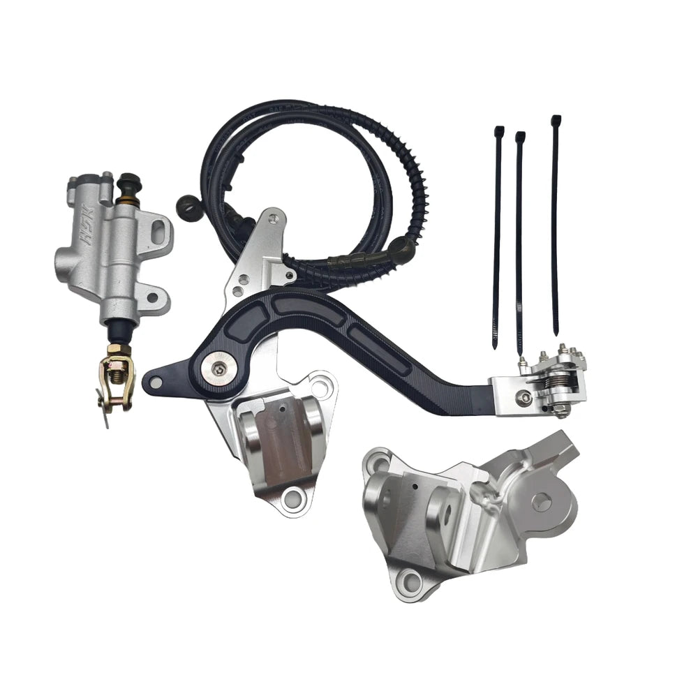 Surron Ultra Bee foot brake V2 kit in silver with pedal, master cylinder, and billet brackets