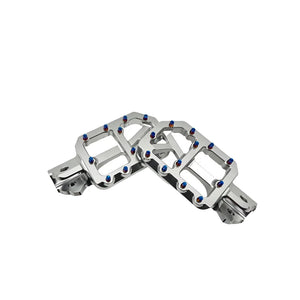 Surron Ultra Bee foot pegs in silver anodized aluminum, 40 percent wider platform than stock with titanium bolts