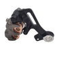 Surron Ultra Bee OEM rear brake caliper, underside angle showing copper sintered pads, caliper assembly, and black caliper bracket