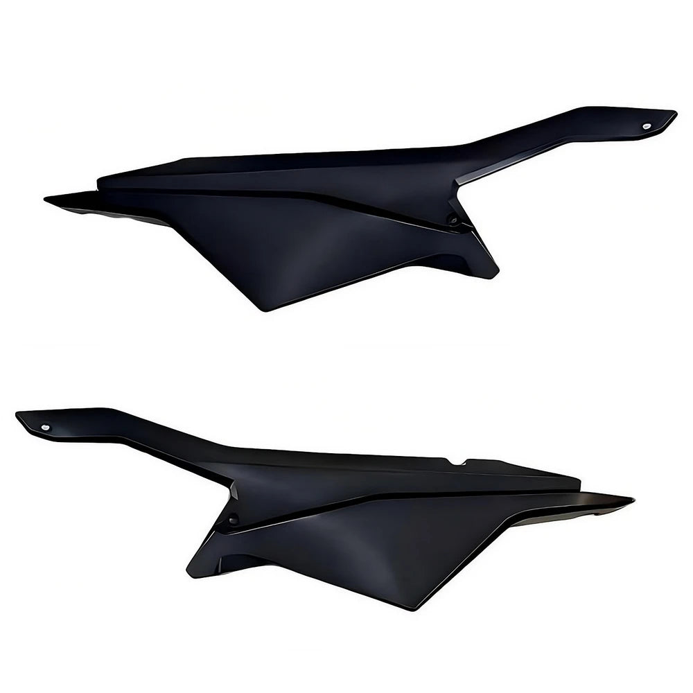 Surron Ultra Bee side panels in black ABS, close-up of the panel surface