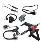 Complete Surron Ultra Bee street legal kit including tail light bracket, turn signals, wiring harnesses, switch, and flasher relay