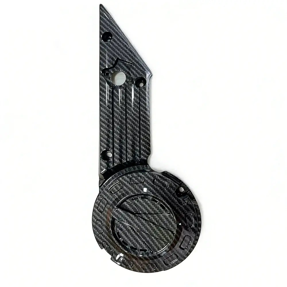 Talaria X3 carbon fiber left side cover, glossy twill-weave finish with circular badge cutout and mounting holes