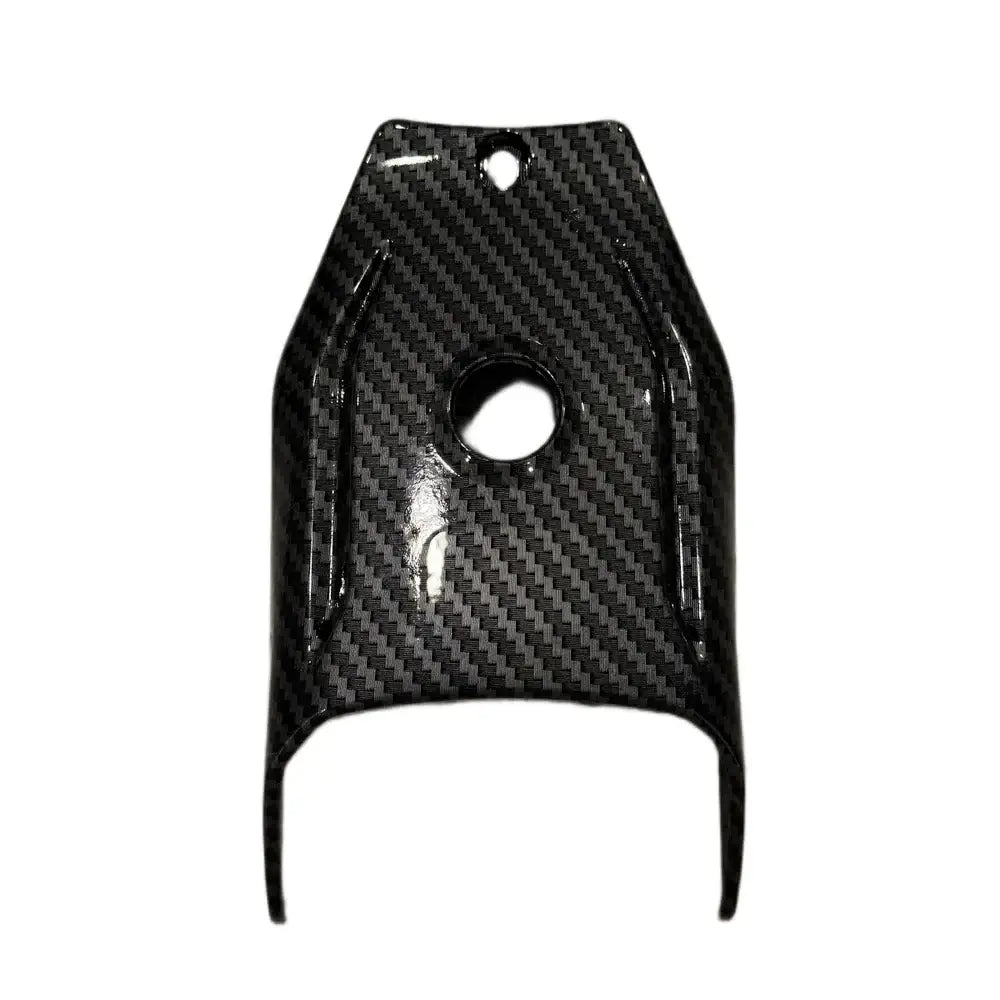 Talaria X3 carbon fiber power button cover, glossy twill-weave finish, front view with circular button cutout