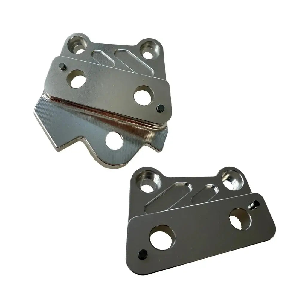 Silver CNC‑machined left and right foot peg brackets for Talaria X3 bikes, durable 6061 aluminum set