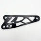 Talaria X3 shift lock bracket, black anodized billet aluminum with Z logo and skeletonized web cutouts, mounting holes