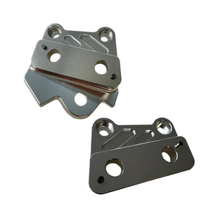 Silver CNC‑machined left and right foot peg brackets for Talaria XXX/X3 bikes, durable 6061 aluminum set