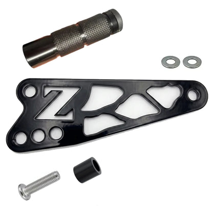 Talaria XXX shift lock kit, black anodized CNC bracket with Z cutout logo, knurled peg, spacer, washers and bolt