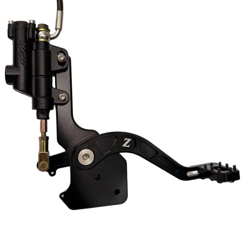 Tuttio foot brake lever and master cylinder mounted to the black CNC bracket assembly