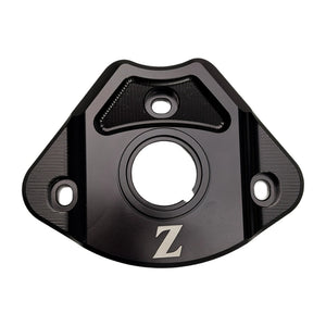 Yozma IN 10 aluminum ignition cover in black, front view with key opening, engraved Z logo and mounting holes