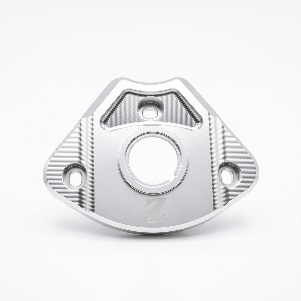Yozma IN 10 aluminum ignition cover in silver, front view showing the ribbed side panels and engraved Z logo