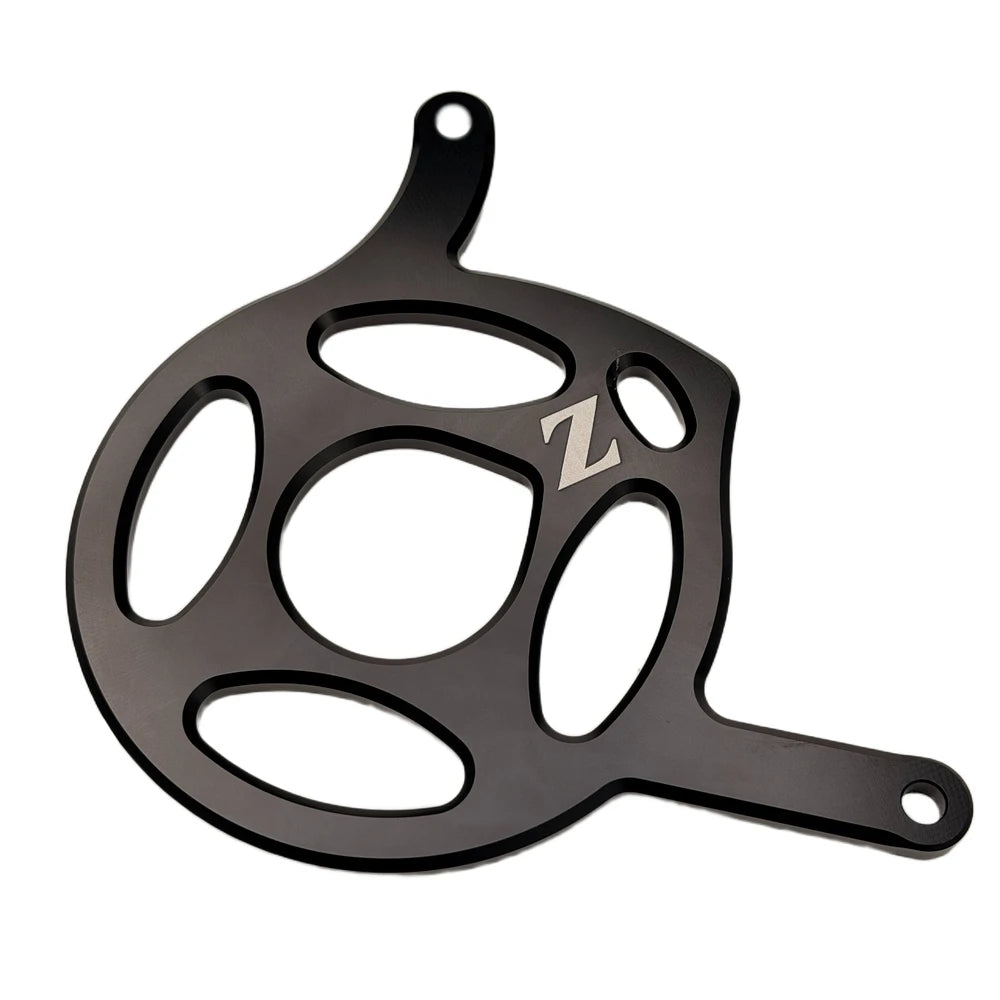 Yozma IN 10 motor cover in black, flat view of the oval cutouts, Z logo and both mounting arm bolt holes
