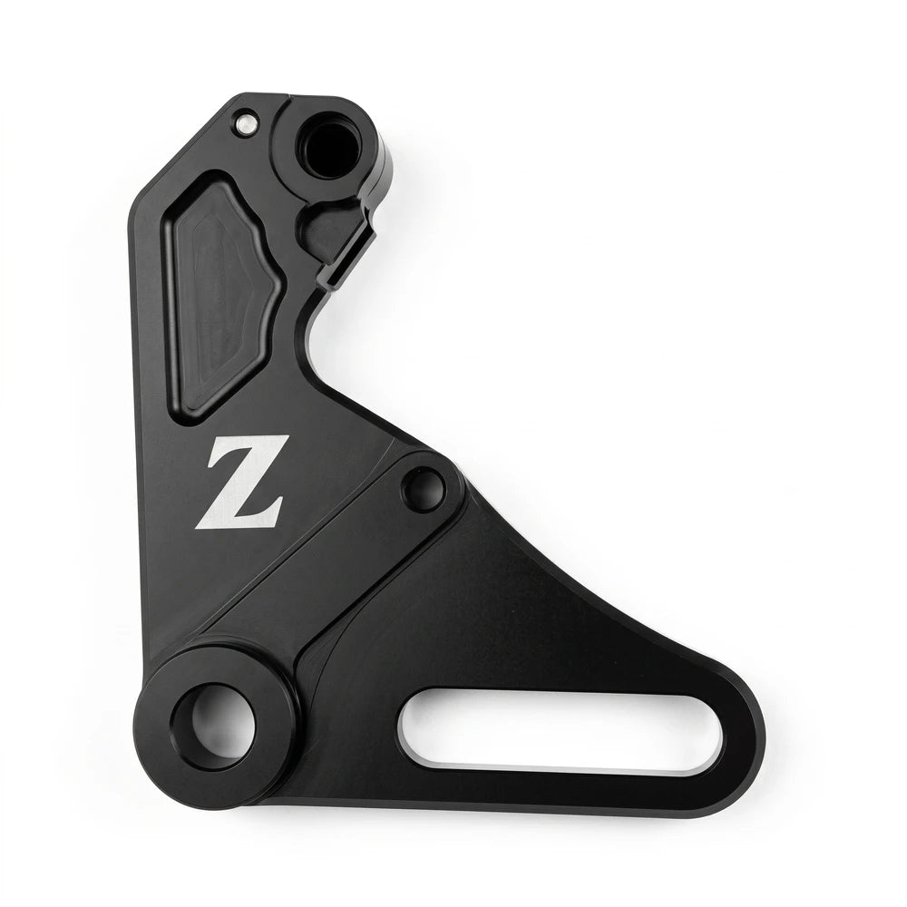 Yozma IN 10 brake bracket, black version with a pocketed upper face and Z logo, flat lay on a white background